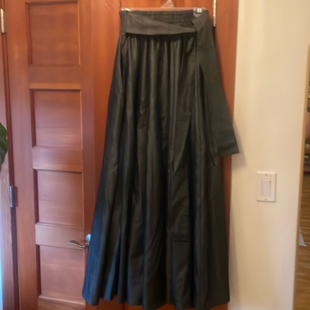 Beautiful full length skirt in lightweight dark denim like fabric.